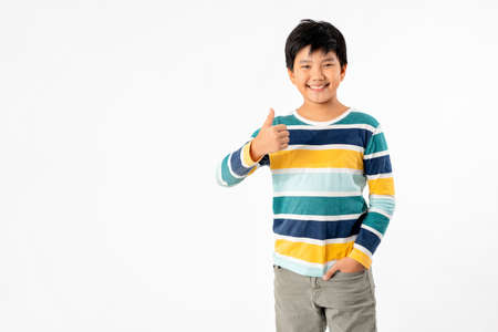 Portrait of Happy Young Asian Boy Isolate on White Background with Copy space.の写真素材