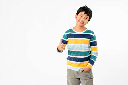 Portrait of Happy Young Asian Boy Isolate on White Background with Copy space.の写真素材