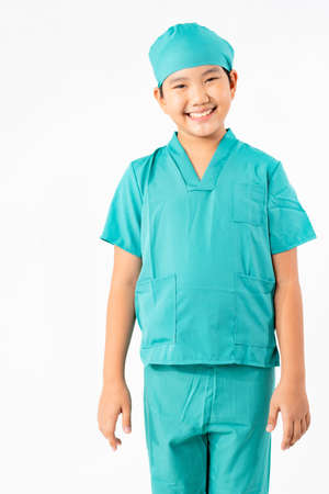 Portrait of Young Asian Boy Dressing to be Doctor Isolate on White Background with Copy space, Education Conceptの写真素材