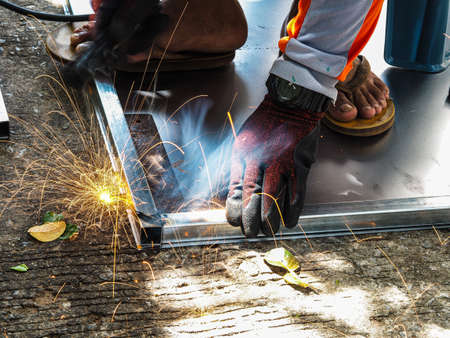 welder connects metal parts to complex structures using electric welding.Selective Focusの写真素材