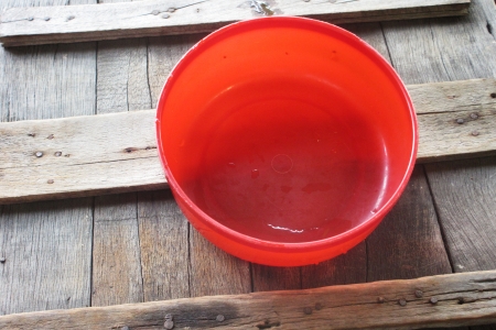 Water plastic scoop on Jar lid background                               の写真素材