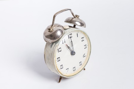 Alarm clock. Brick white wallの写真素材