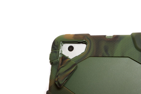 Tablet computer in a military case. khaki. Modern communication device.