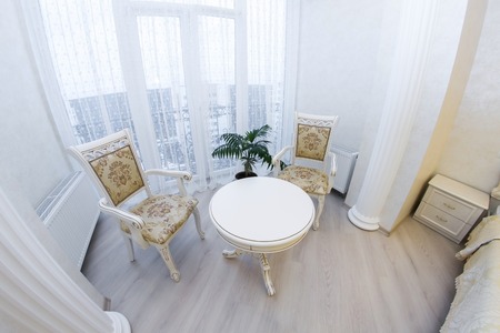 Luxury bedroom interior. coffee table and vintage chairの写真素材