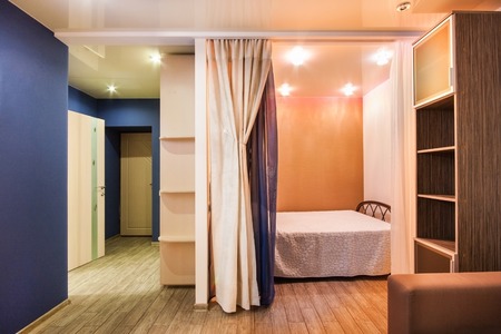 Room with soothing colors, homely atmosphere. studio apartmentの写真素材