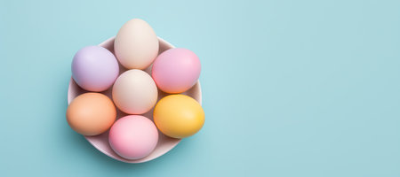 Easter eggs on blue background. Happy Easter greeting card. Springtimeの素材