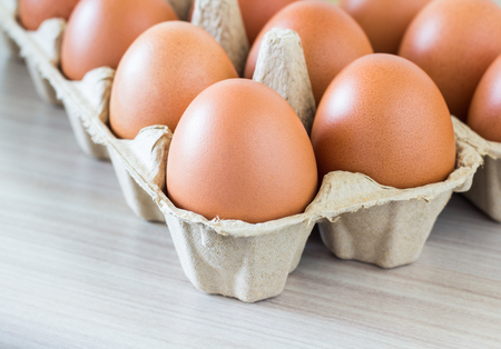 Group of fresh egg in carton, selective focus