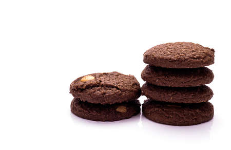 Chocolate cookies with almond on white backgroundの写真素材