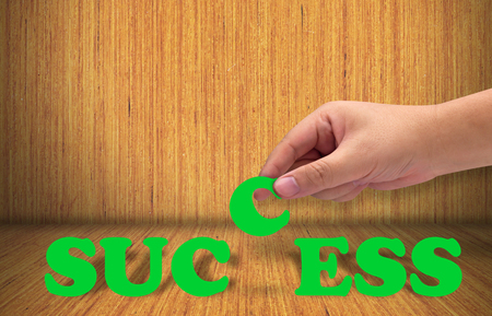 Business success concept, hand and text target to  growth and achievementの写真素材