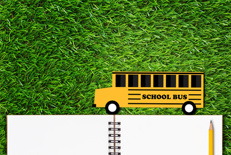 Education concept, knowledge management, back to school, paper cut yellow bus, pencil and open...