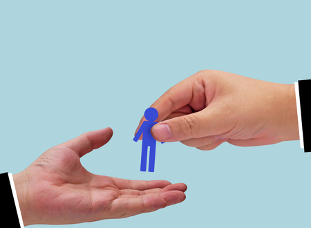 Human resource management, teamwork concept, business recruitment, paper people and handの写真素材