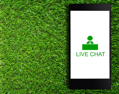 Live chat concept on mobile phone, business communication technology, customer serviceの写真素材