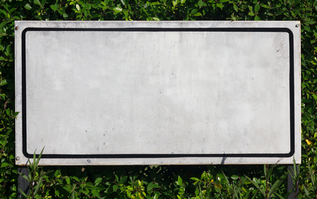 White iron sign on green background, nature and ecology conceptの写真素材