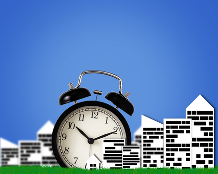Time management concept, business planning, city and town on blue backgroundの写真素材