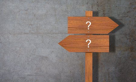 Business problem or confused concept, wooden sign on concrete backgroundの写真素材
