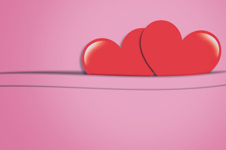 Red heart on pink vintage background with copy space, love, valentine and wedding conceptの写真素材