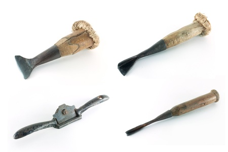 old chisel and old wood plane  on white backgroundの写真素材