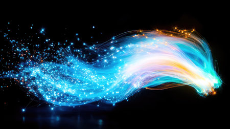 Blue and white light trails from fiber optic lines in the dark, highlighting data transfer and connectivityの素材