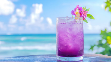 A vibrant purple cocktail garnished with a flower sits on a wooden table, highlighting a picturesque ocean view. Perfect for summer relaxation.の素材