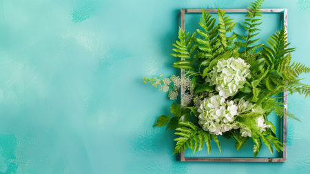 This image showcases a stunning framed arrangement of vibrant green ferns and soft white hydrangeas on a turquoise background, perfect for home decor.の素材