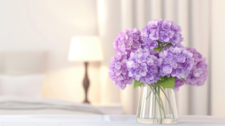 A stunning arrangement of purple hydrangeas in a clear vase, resting elegantly on a soft table. This scene captures the essence of tranquility and beauty, perfect for home decor.の素材