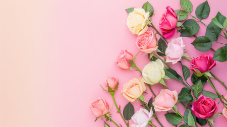 A stunning display of fresh roses in various hues paired with lush green leaves, perfect for enhancing a floral arrangement or decoration.の素材