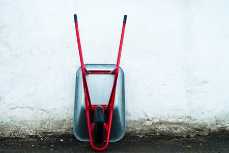 garden cart on a white wallの写真素材