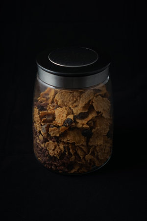 isolated cereal bottle with black backgroundの写真素材