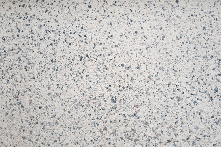 Color spot on white cement wall backgroundの写真素材