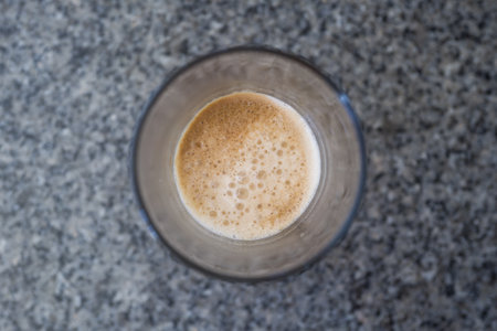 Closeup espresso shot on the stone tableの写真素材