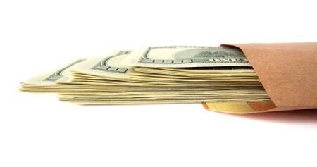 Open packet of dollars on the white.