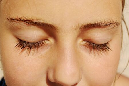 Girl face with close eyes.