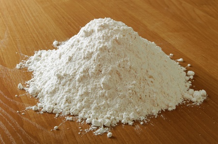 Heap of dry meal on table.の写真素材