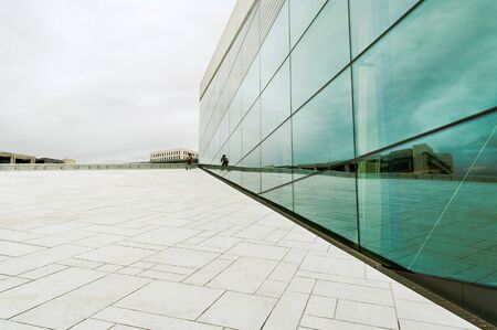 Running boy on roof of Oslo opera.のeditorial素材