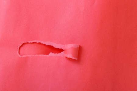 Abstract hole on red paper 