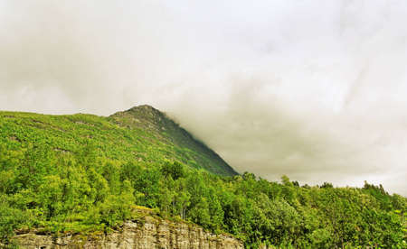 Clouds above Norway mountain in a summer season の写真素材