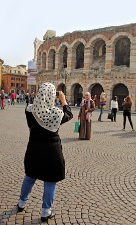 VERONA-APRIL 2  People on the Central square in Verona at the Coliseum on April 2, 2011 in Italy のeditorial素材