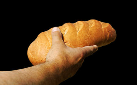 Man had white bread in his hand 