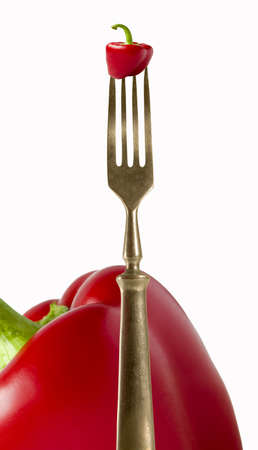 Bizarre peppers with fork の写真素材