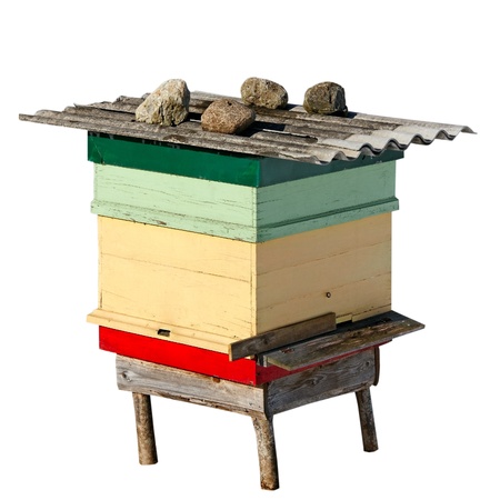 Ready beehive for bad weather, isolated on white surface の写真素材