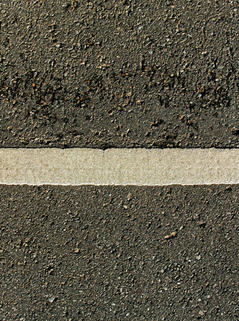 White line on the asphalt road.