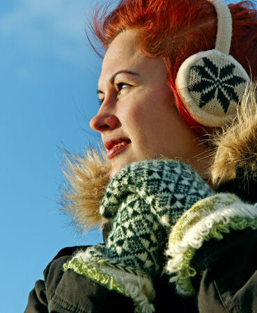  Young woman in warm soft clothes.