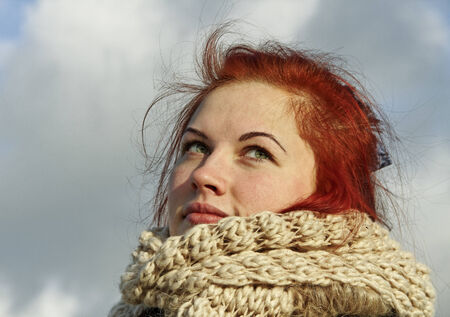 Redhead woman wearing warm cloth.の写真素材