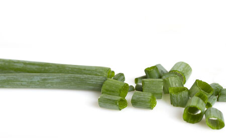 Cut raw onion on white surface.の写真素材