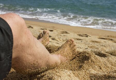 Man on the beach of Mediterranean sea.の写真素材