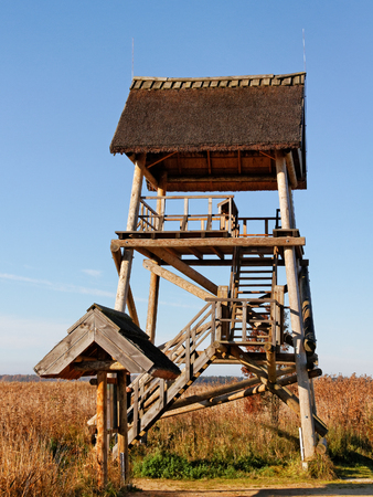 Bird watching tower next to the lake.の写真素材