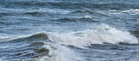 View of storm seascape with big waves.