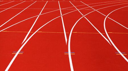 Red running tracks in sport stadium.の写真素材