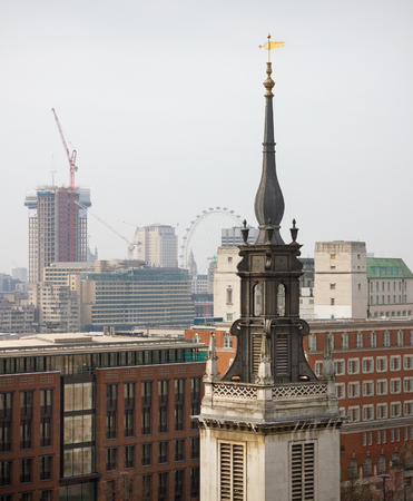 LONDON,UK-MARCH 8: London is a world cultural capital. View from roof to buildings in London next to the St Pauls Cathedral on 8 March 2014, UK.のeditorial素材