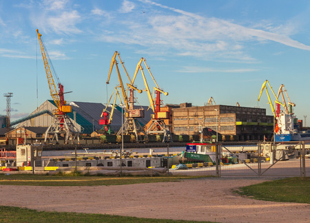 VENSPILS, LATVIA-JULY 31: Venspils is situated on the Venta river and the Baltic Sea and has an ice-free port. Embankment of river Venta on July 31, 2016 in Venspils, Latvia.のeditorial素材